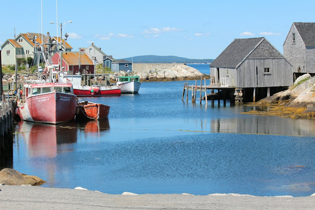 Colorful fishing village houses along the coast of Nova Scotia